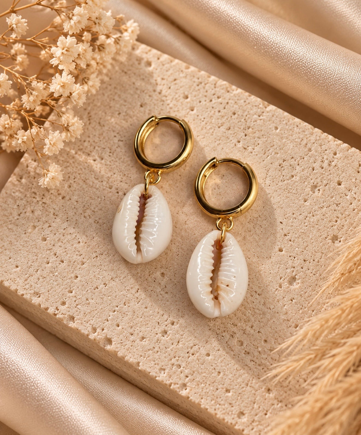 gold ring cowrie huggies