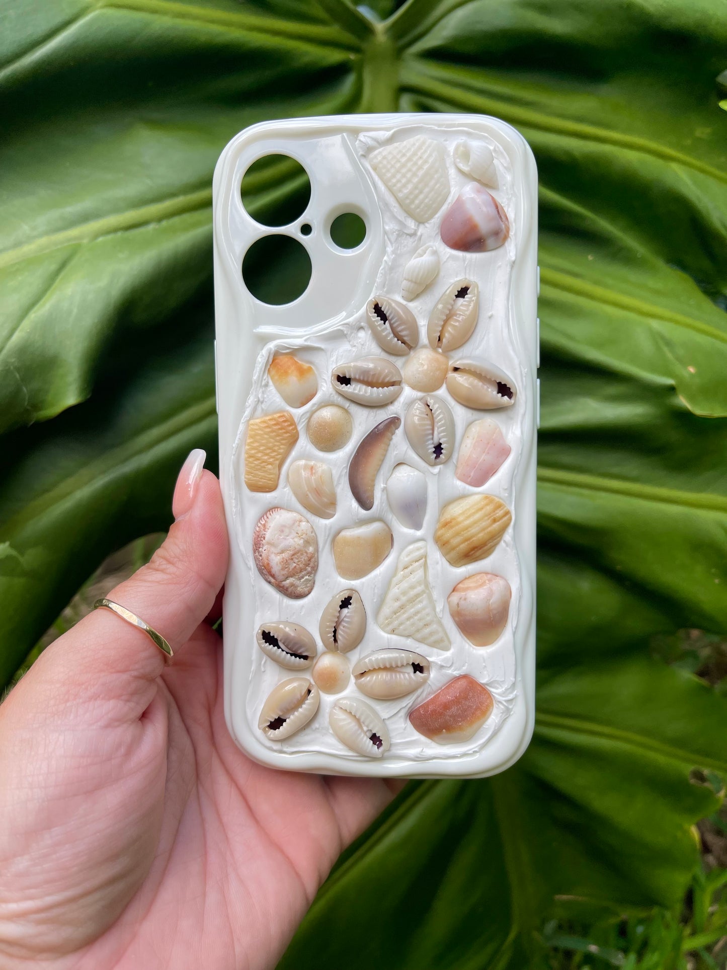 "pua cowrie" phone case